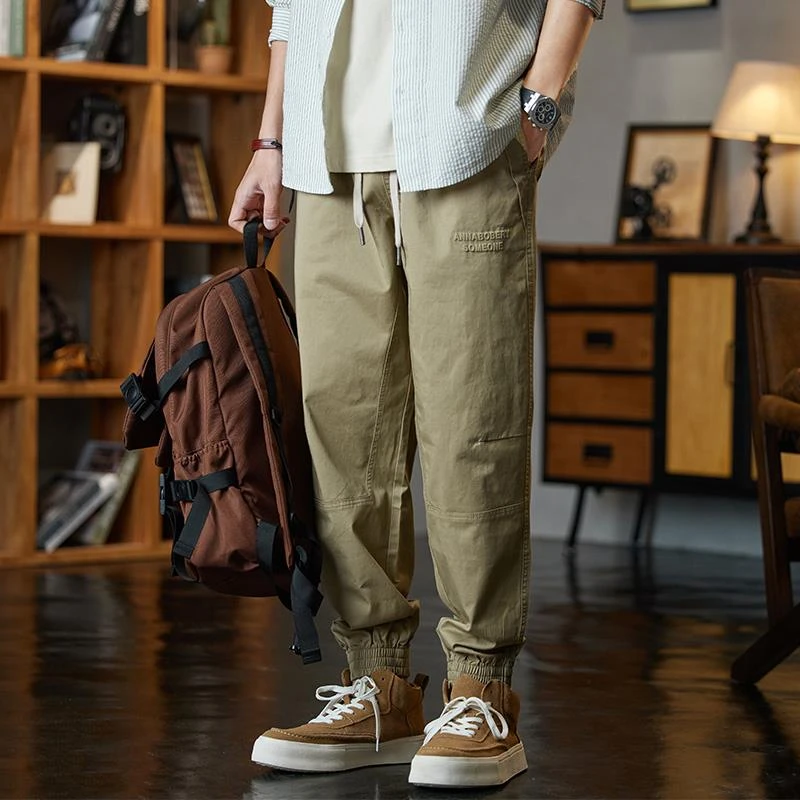 潮牌卡其色工装休闲裤男士春季新款宽松简约百搭弹力束脚哈伦裤子