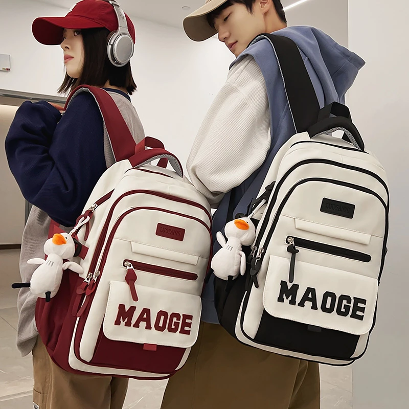 减负大容量书包男士高中学生初中生双肩包女款大学生休闲旅行背包