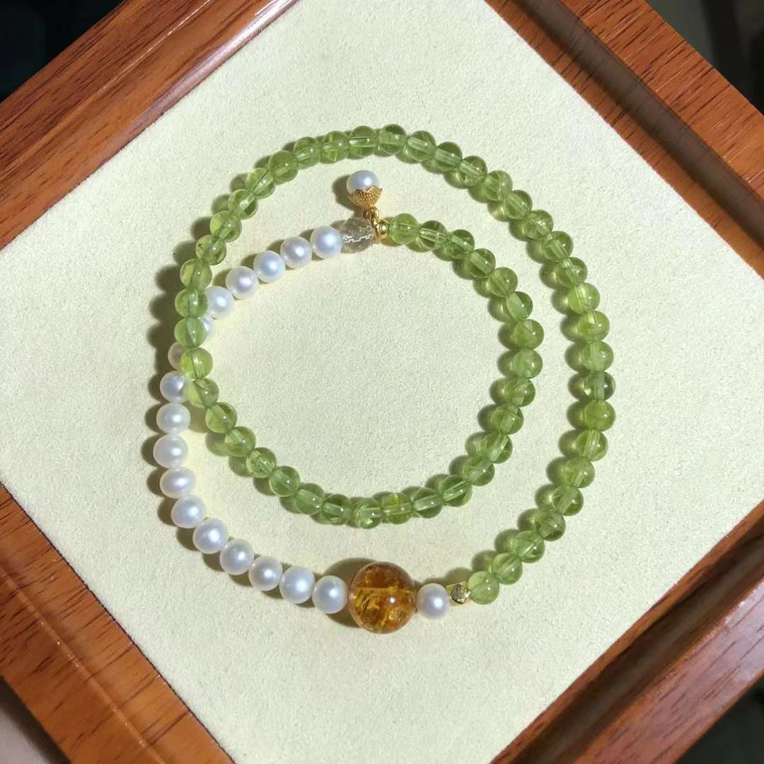 【不可方物】橄榄石珍珠双圈手串花珀主珠珍珠吊坠520女友礼物