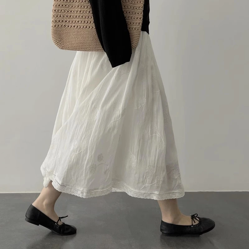 白色刺绣设计感半身裙夏季薄款镂空A字法式超仙中长款显瘦蓬蓬裙