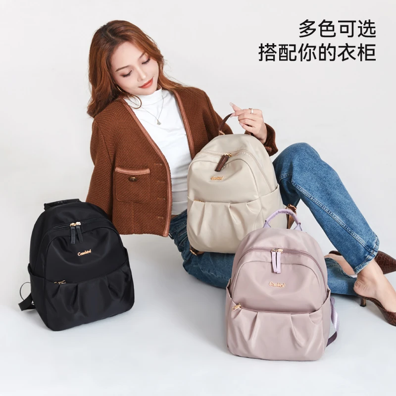 时尚休闲轻便百搭双肩包女多功能大学生多色背包出游小包妈咪包