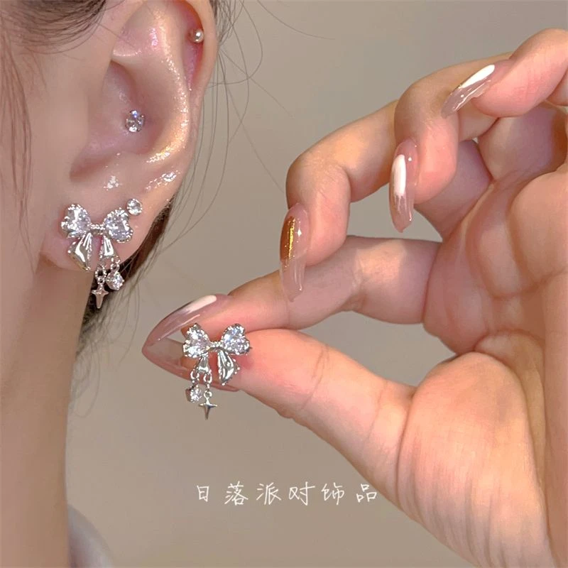 星芒蝴蝶结锆石耳夹女小众设计时尚耳饰耳骨夹气质百搭蚊香盘耳夹