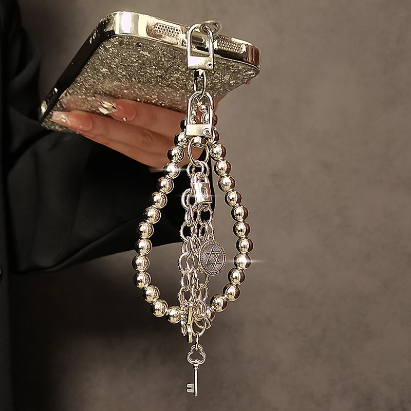 个性创意银串珠手提链手腕短挂绳带夹片手机壳钥匙扣包包挂件女潮