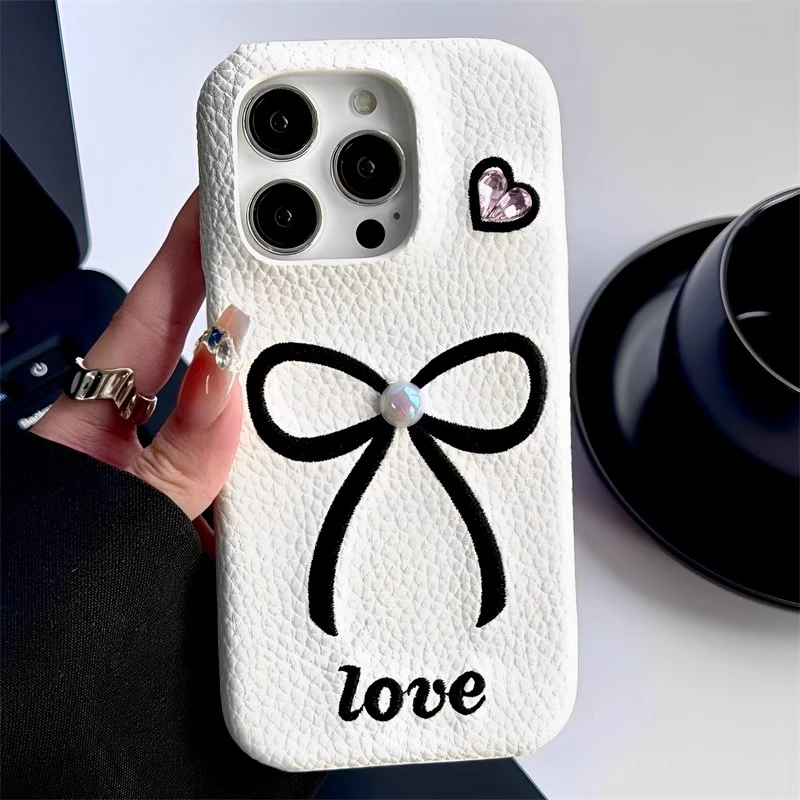 皮质爱心立体蝴蝶结适用iphone16pro苹果15手机壳网红女款个性ins