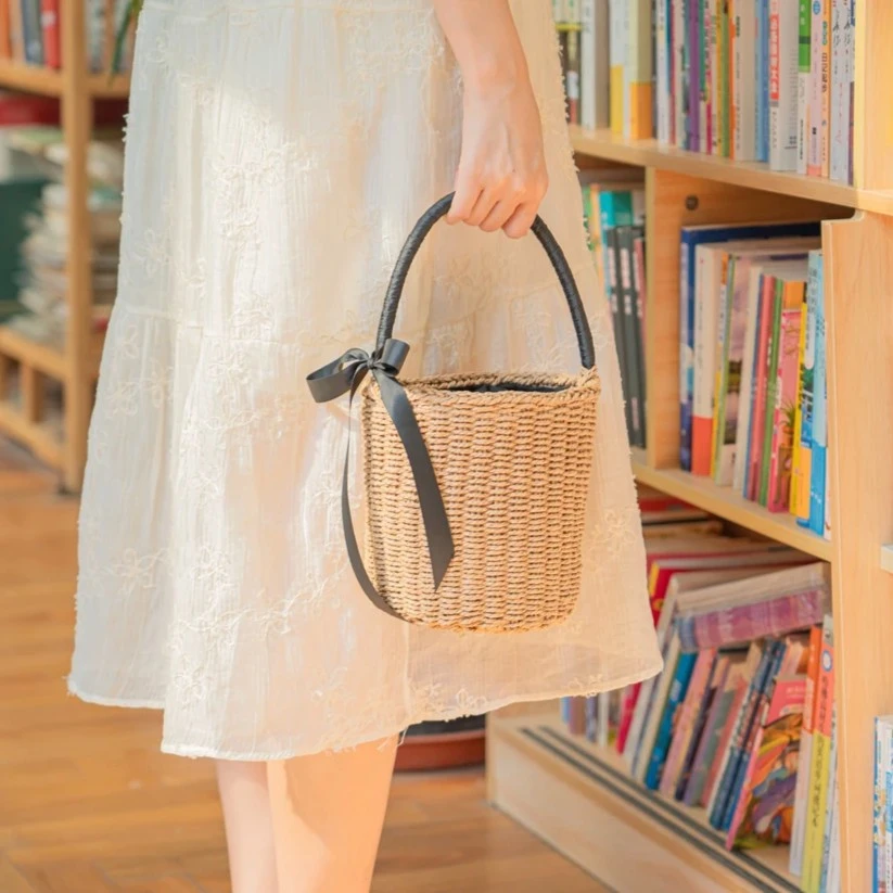 CB003百搭时尚小香风洋气水桶包气质夏季韩版小众编织沙滩包抽带