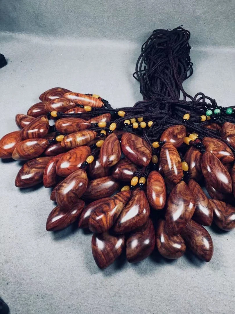 海南黄花梨精品随型野生料满纹标本吊坠随机发货单个价格