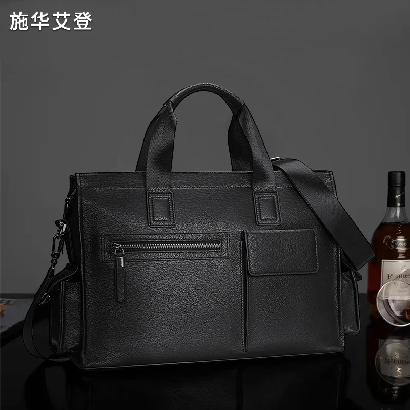 施华艾登男人商务旅行头层羊皮冲孔镂空公文包休闲高档真皮商务包