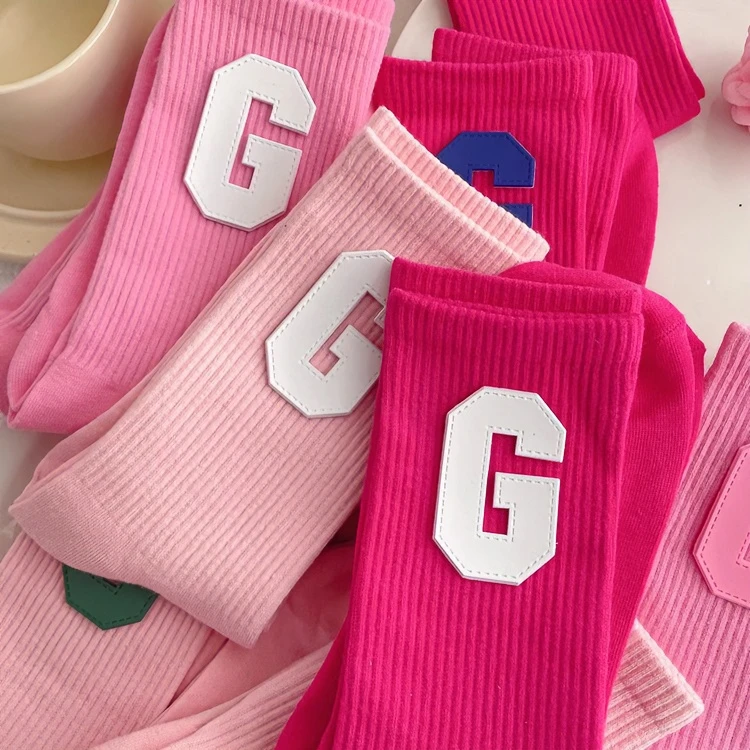 秋冬袜子女字母G个性粉色中筒袜潮日韩网红纯色长筒袜运动外穿ins