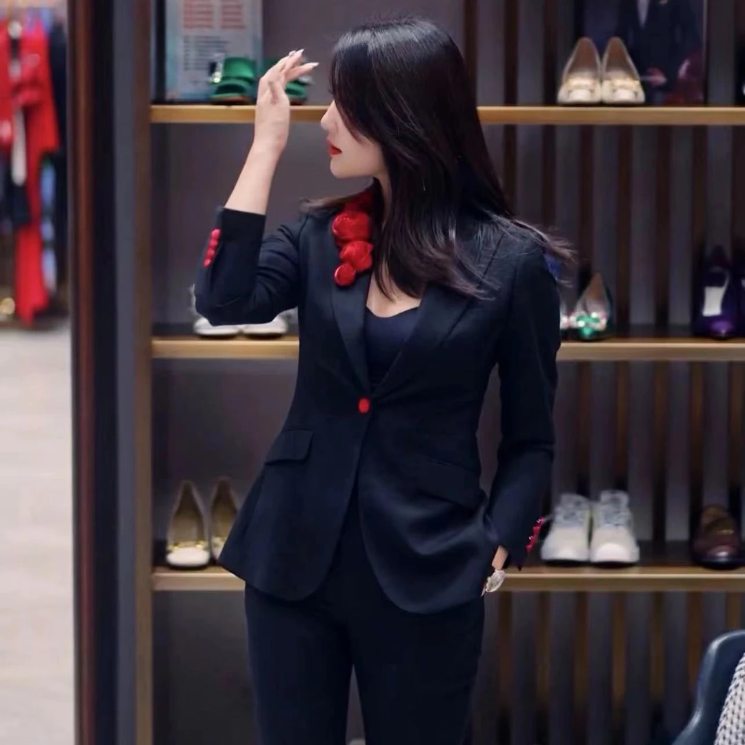 臻韩美2024时尚黑玫瑰长袖微喇裤套装2407#