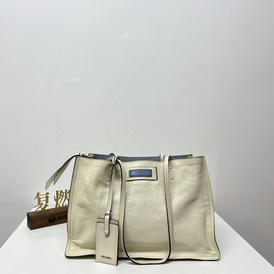 95新 Prada/普拉达 复燃精选/普拉达 白色蓝标托特单肩包