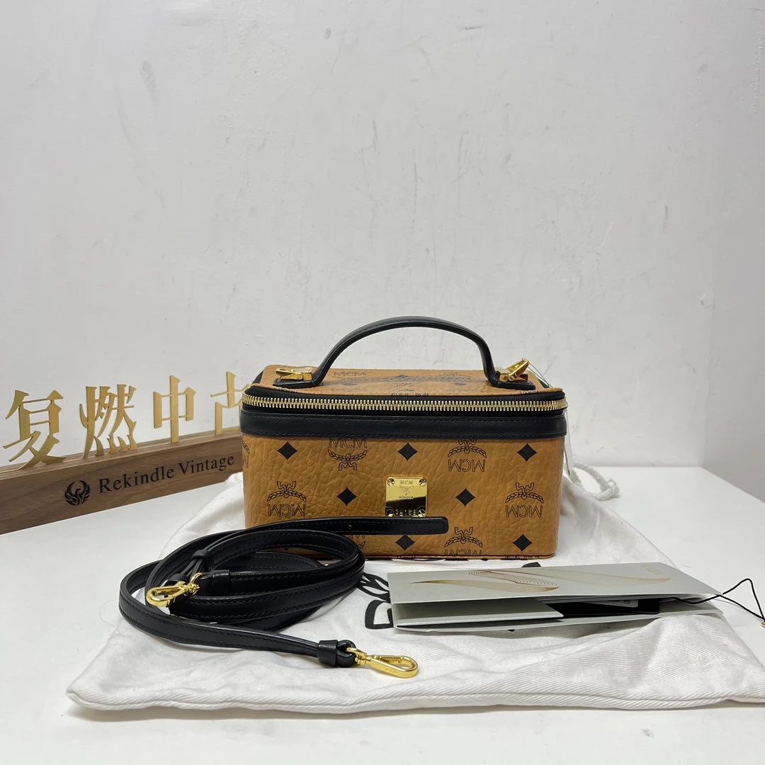 99新 MCM 复燃精选/MCM 干邑色拼黑色mini化妆盒