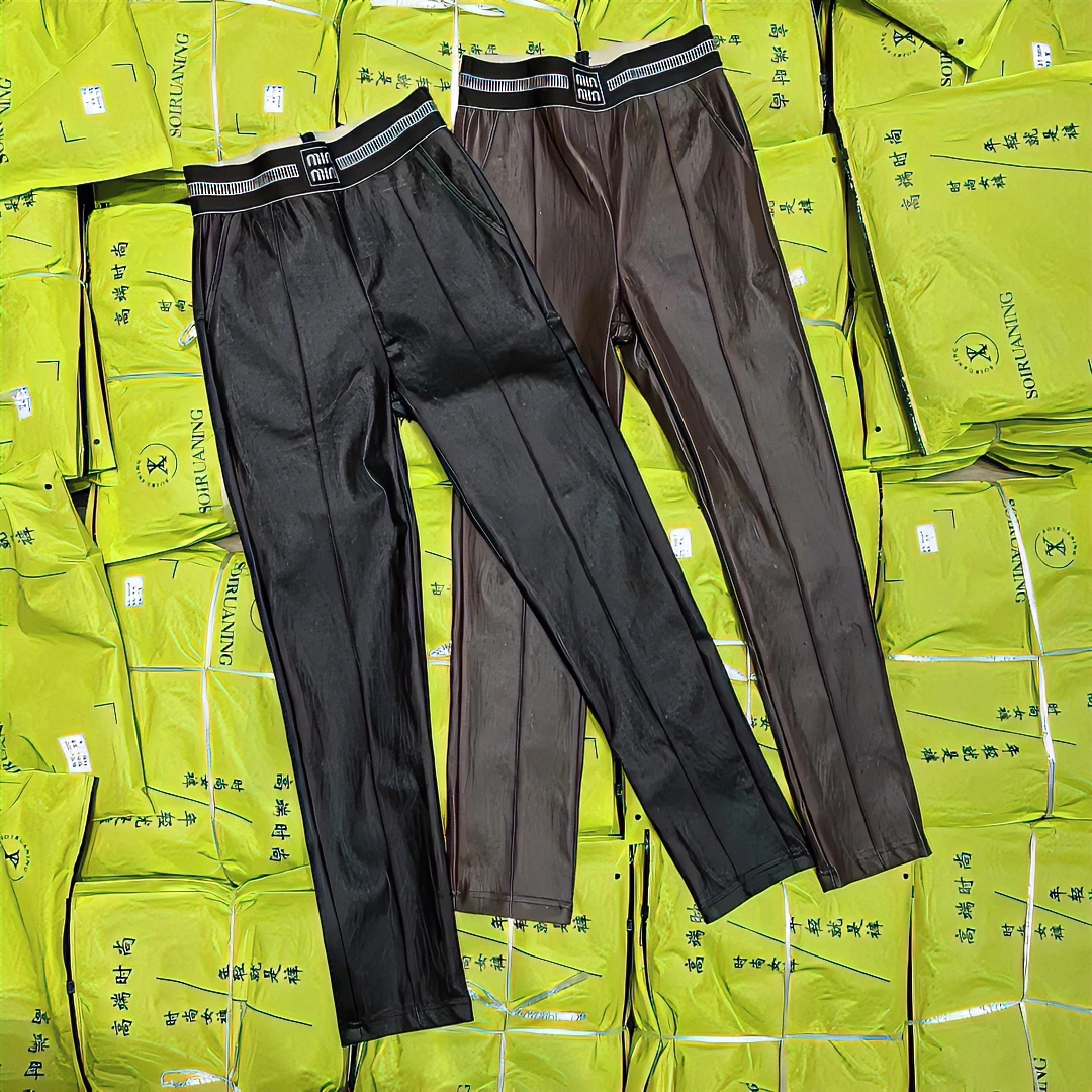 【倩倩】秋季加绒新款韩版百搭不规则裤腿九分纯色PU外穿小脚裤9323