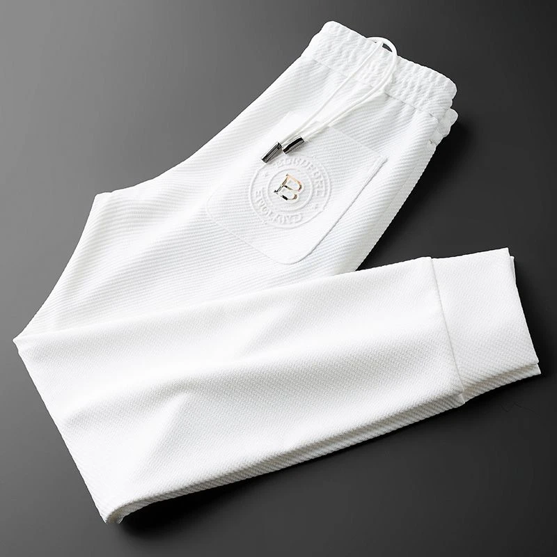 轻奢春季新款高端欧货斜纹面料白色裤子男修身束脚休闲卫裤男士潮