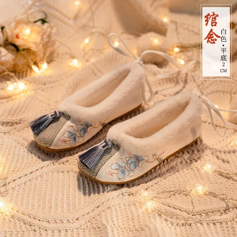 绣花鞋女冬加绒流苏布鞋汉元素妈妈鞋软底牛筋底复古民族风毛毛鞋