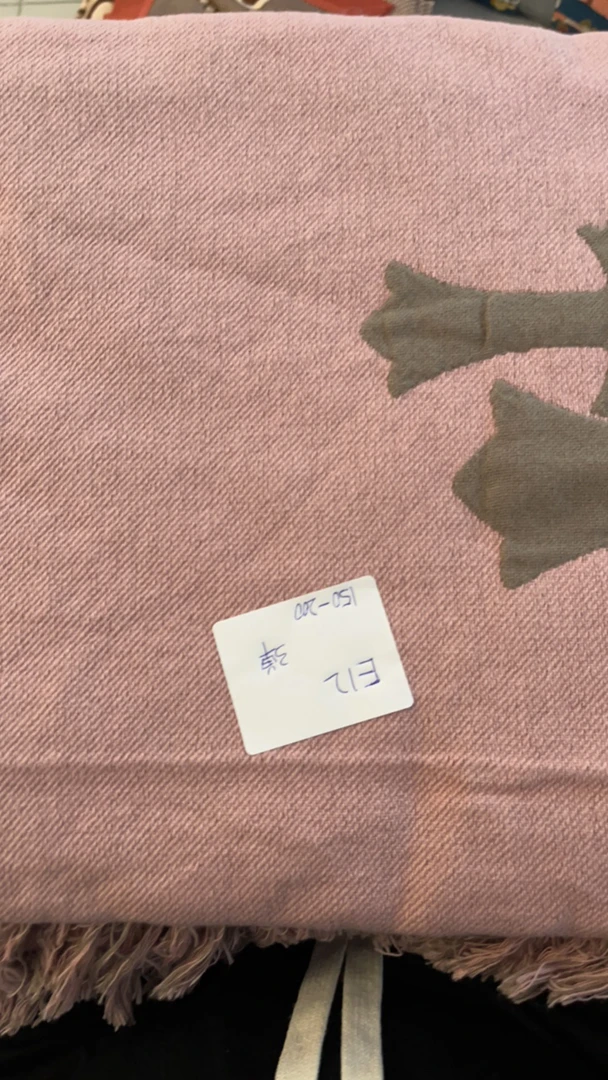 E12粉色十字流苏盖毯150-200