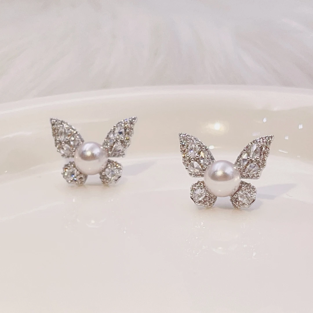 铜合金仿珍珠耳饰 微镶锆石蝴蝶珍珠耳钉气质甜美曼塔玫瑰紫耳环