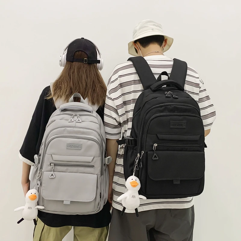 书包男生大容量背包初中生高中学生双肩包时尚潮流大学生电脑包女