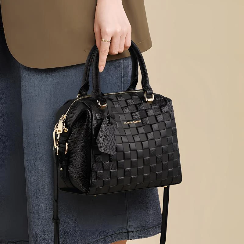 头层牛皮高档手提包女包2024新款斜挎大容量小众通勤枕头波士顿包