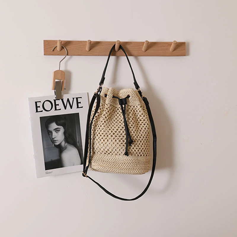 水桶斜挎包手提镂空编织大容量2024新款ins单肩百搭海边草编包