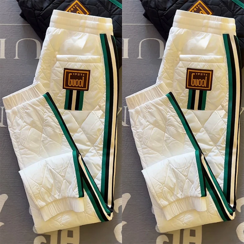 男士保暖棉裤冬季新款时尚潮牌防寒轻奢条纹小脚裤简约百搭休闲裤