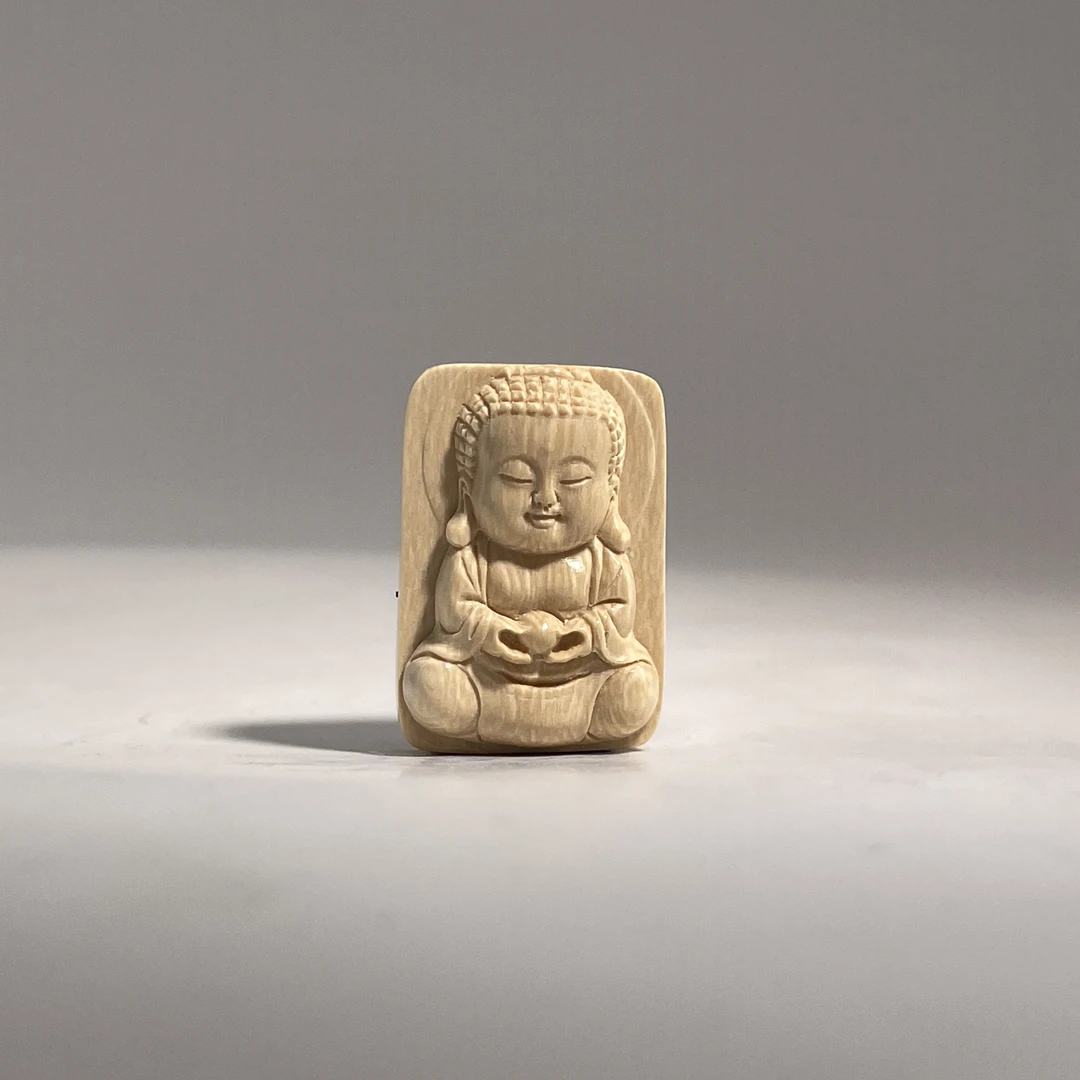 猛犸牙雕白冰料宝宝佛牌吊坠28*19*10mm假一罚四W5509