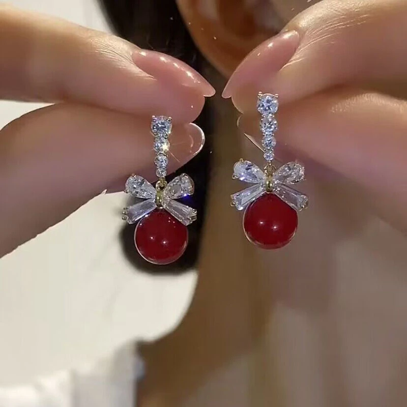 铜合金耳饰 闪亮蝴蝶结红色珠珠耳环时尚轻奢百搭设计感银针耳钉
