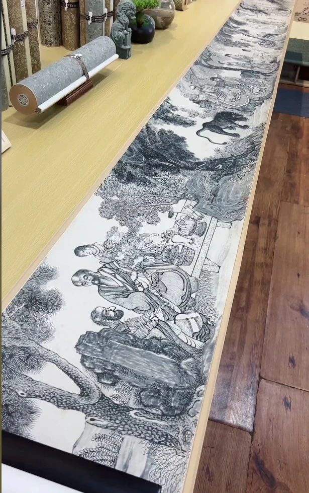 明丁云鹏 应真云汇图 纸本 人物33.8x789.84cm-CJ台北故宫博物院