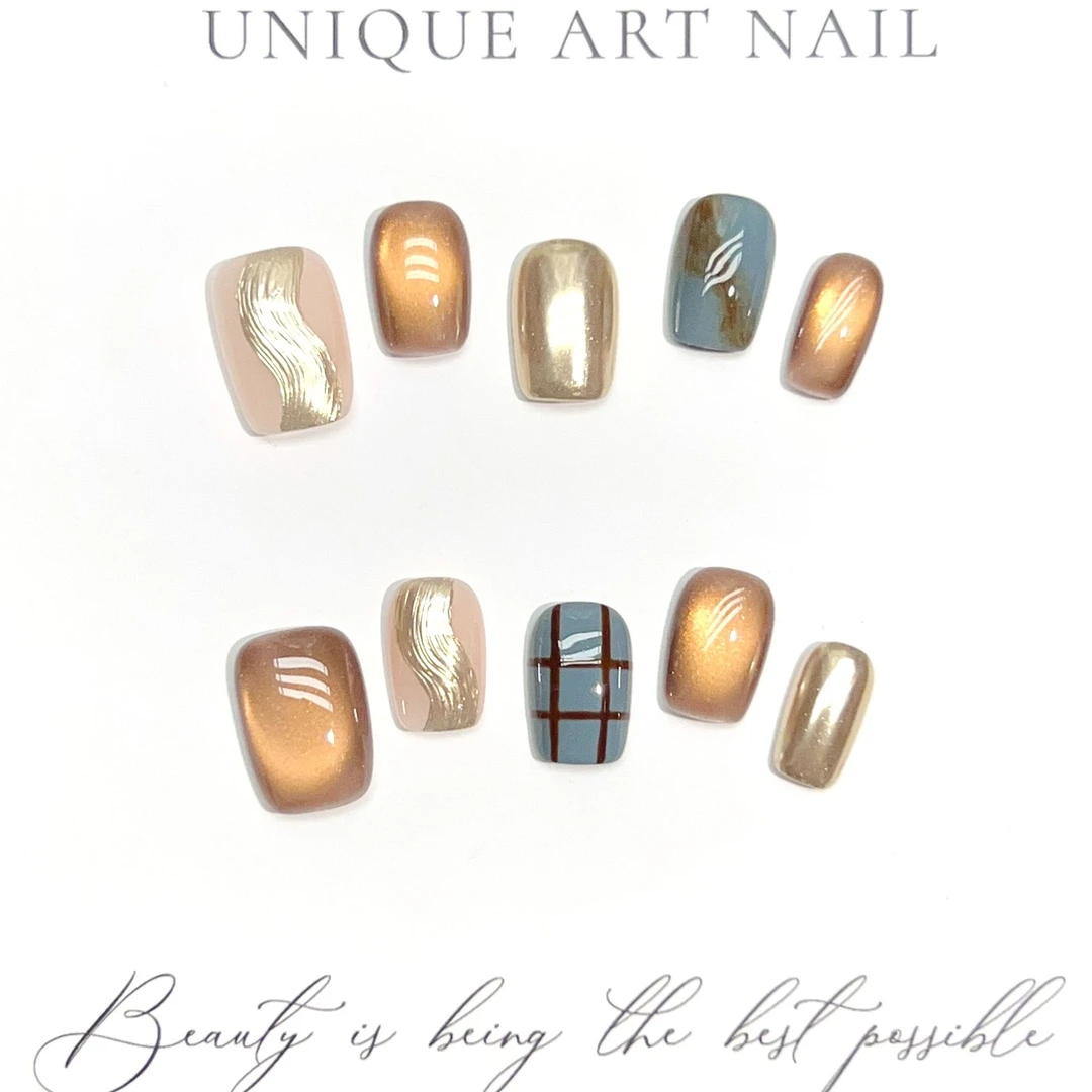 X罗马假日  秋冬新款琥珀猫眼美甲轻奢跳色手绘可拆卸