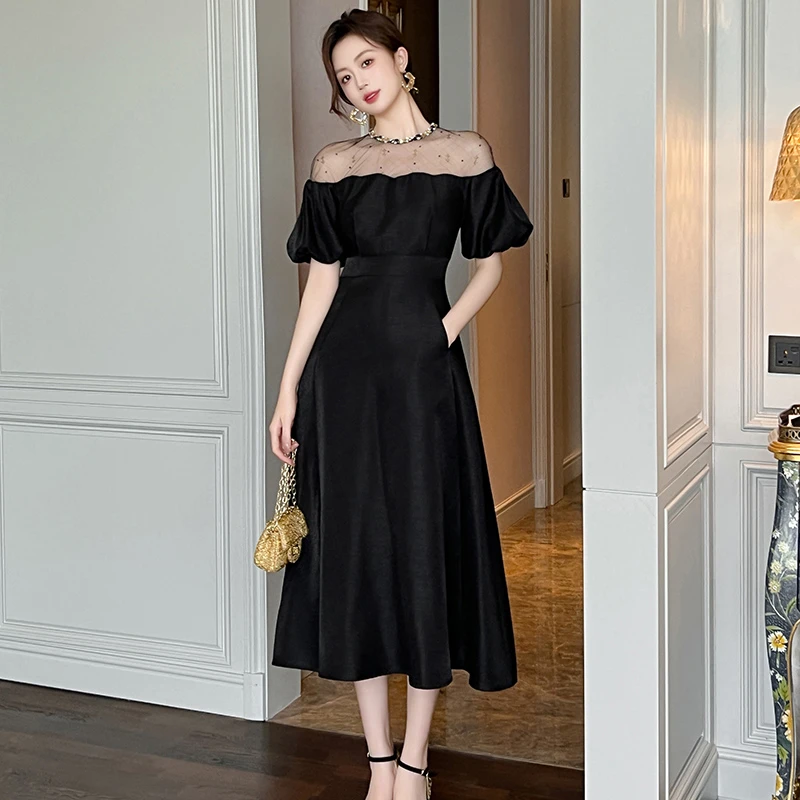 新款洋气千金感修身网纱拼接小黑裙一字肩中长款连衣裙21348