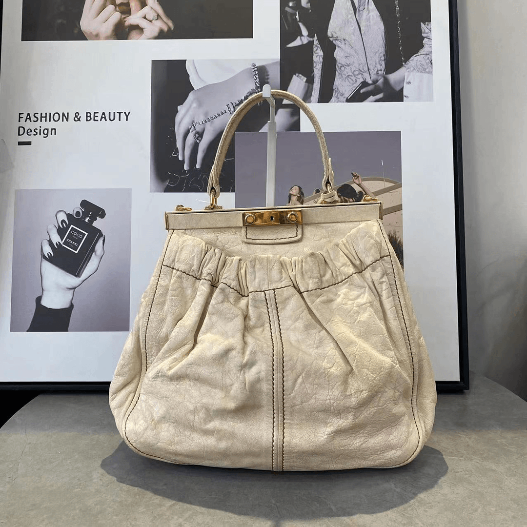 95新 MIU MIU/缪缪 大有/miumiu白色全皮手提包/06637