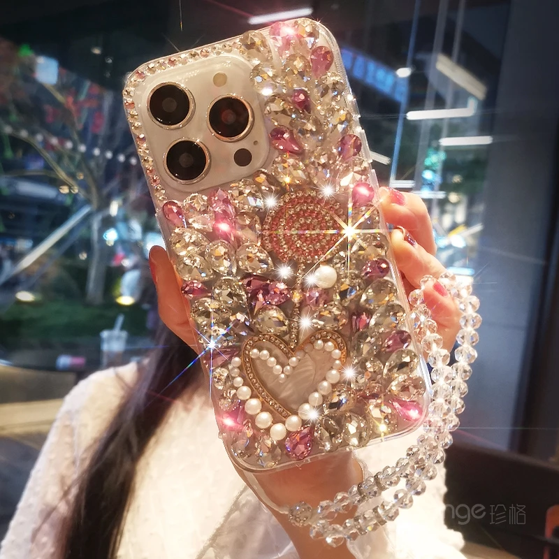 适用苹果13/14/15/14plus13pro15Pro手机壳水钻彩虹糖满钻奢华