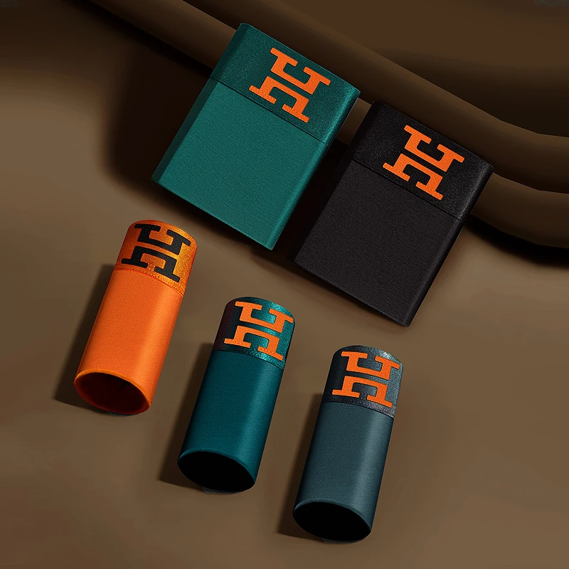 奥薇丽无痕裸感舒适轻肤透气男士平角裤中腰潮流个性男四角裤内裤