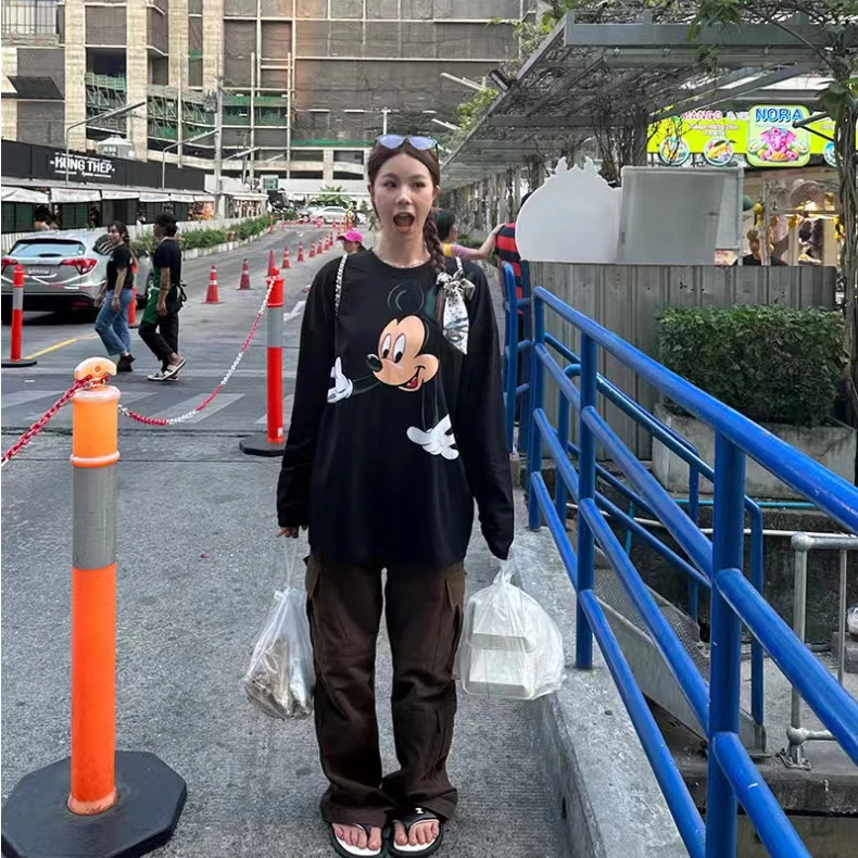 《赵小姐服饰》美式复古趣味卡通印花黑色长袖T恤女秋休闲宽松上衣