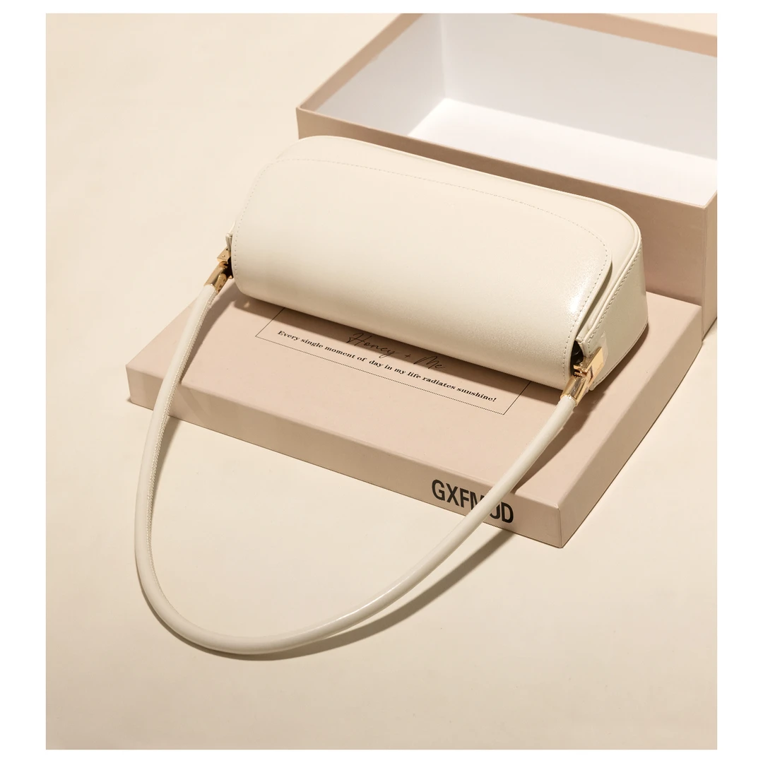 GXFMOD时尚包包女高级感牛皮腋下法棍包2025夏新款气质单肩通勤包