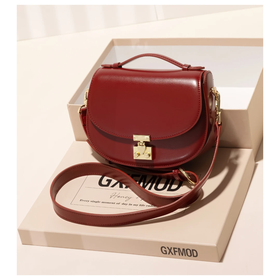 GXFMOD新款高级感牛皮马鞍包复古手提红色包包2025单肩斜挎新娘包
