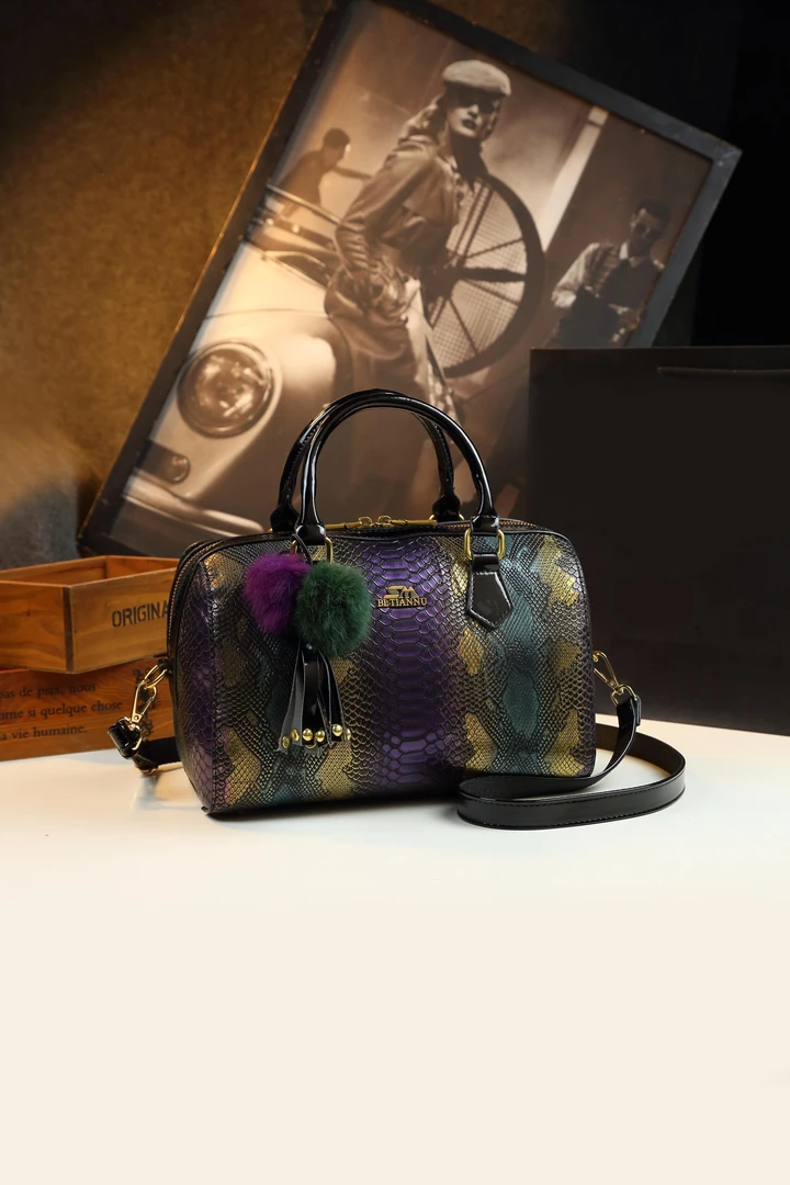 27*13*16枕头包面包女士手提包时尚波士顿包丹宁斜挎包紫绿D0045