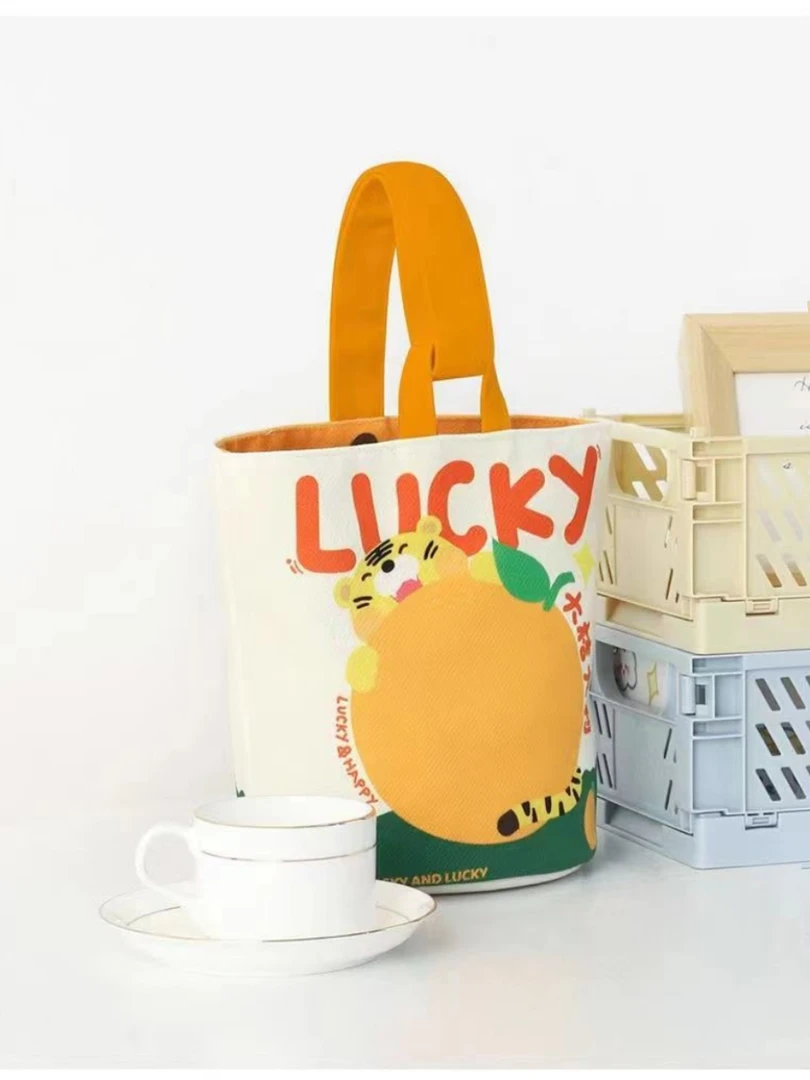 2025年水桶包新款帆布印花随身小手提包妈咪包便当外出小拎包C919