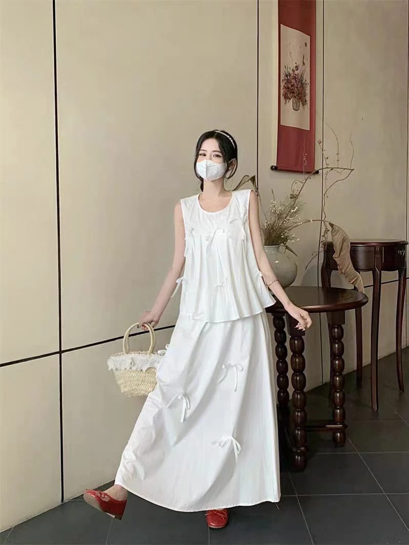 法式气质套装显瘦蝴蝶结律动莫兰迪设计感无袖上衣女高腰半身裙