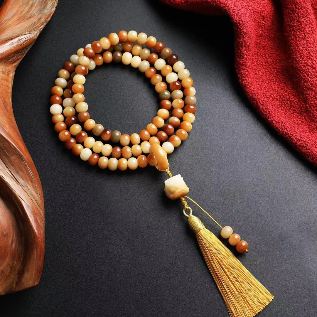 （桃）炭烧敦煌飞天菩提根（金色流苏，搭配跑环小狮子，尺寸9 x 7）