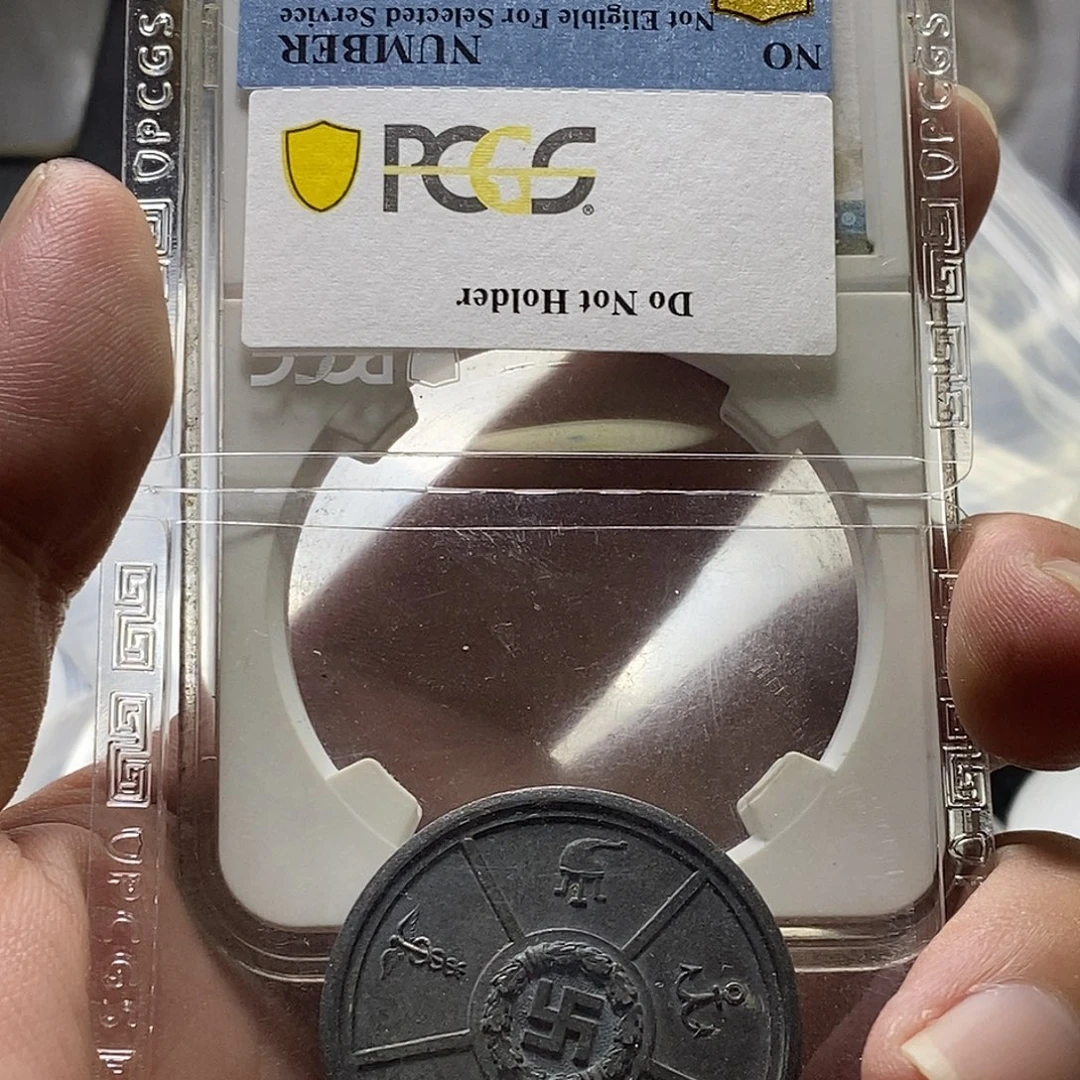 用***8普通金属币送评回来了 小胡子章