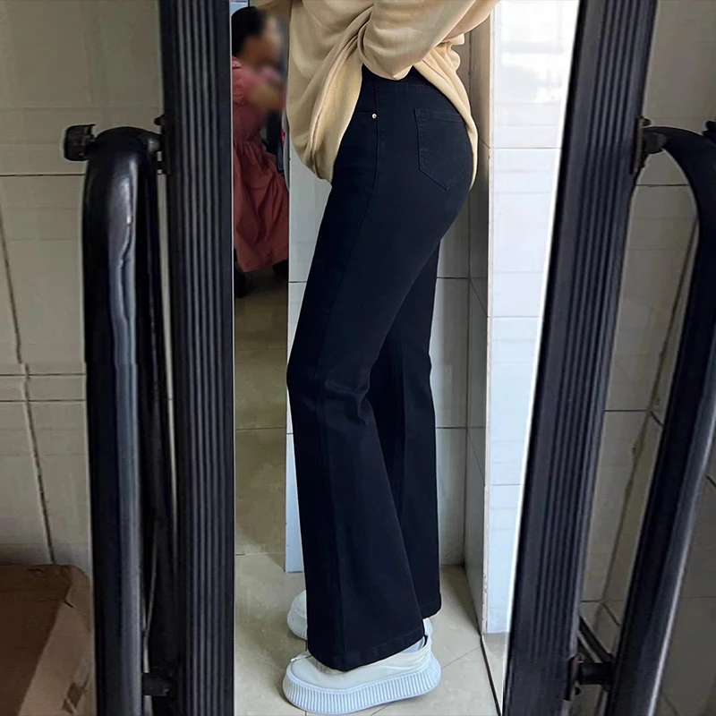 雪千羽黑色微喇牛仔裤女2025秋季新款加绒弹力显瘦梨形身材马蹄裤