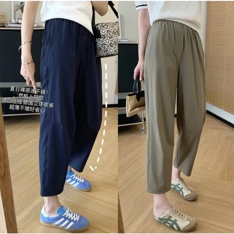 D-1033【素】夏季新款 小O刺绣裸感速干裤九分休闲裤女6547