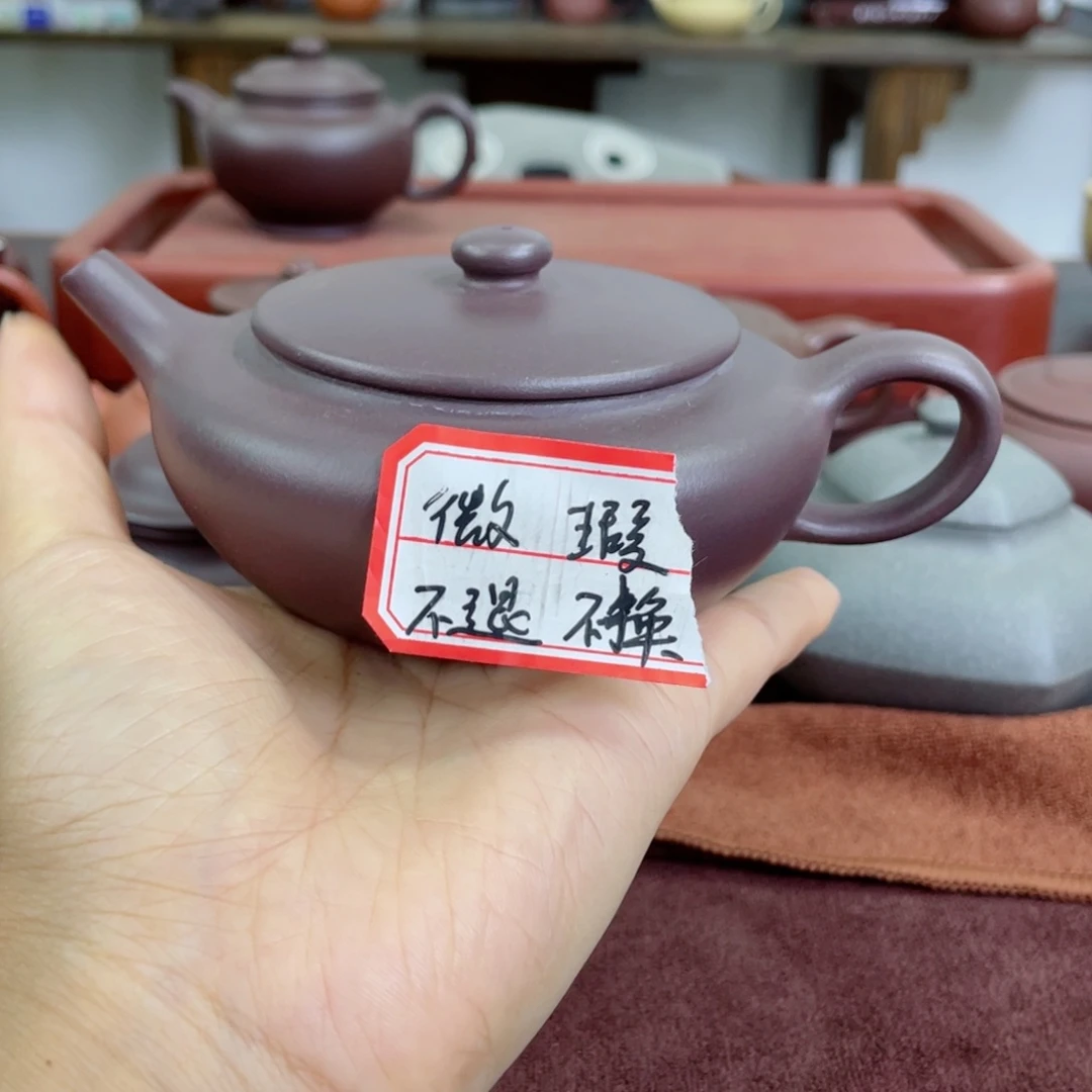 茶壶紫砂扁晨。