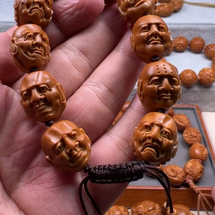 明***戈橄榄核手串橄榄核雕工艺制作