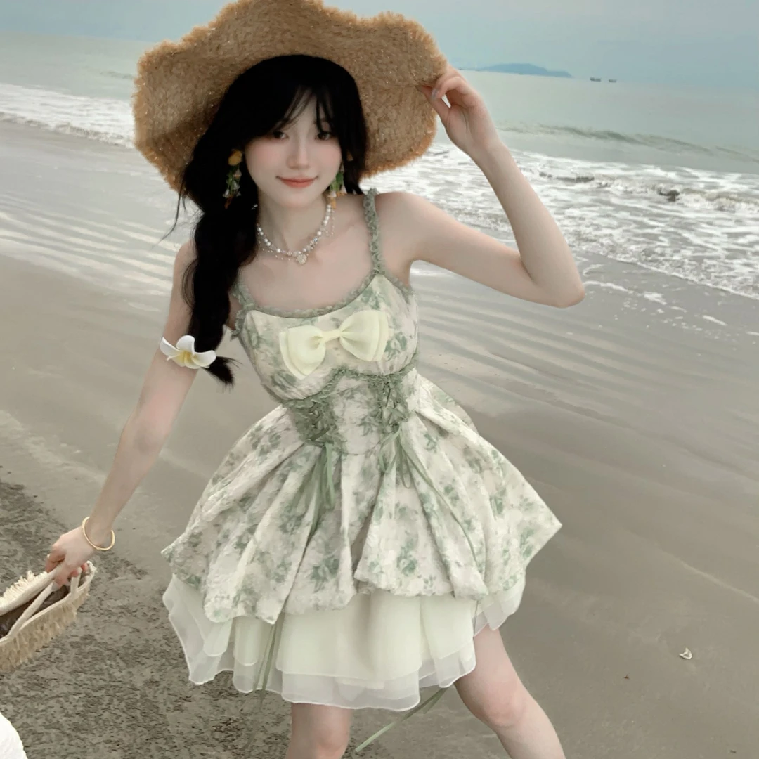 Blovelan季夏之声森林精灵印花蝴蝶结收腰花苞公主吊带裙连衣裙