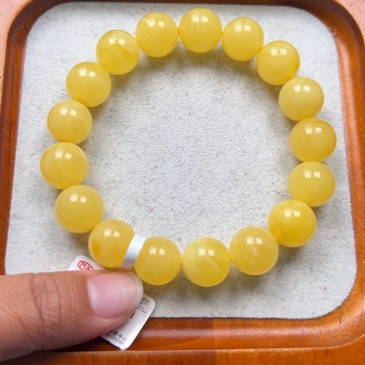 琥珀未镶嵌珠宝奇石M220号12.6+鸡油黄妖花