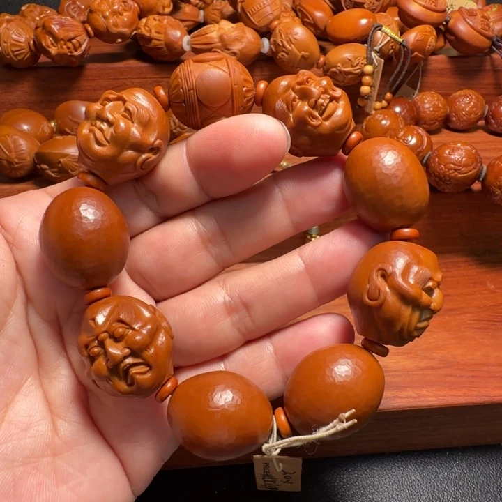 橄榄核手串喜怒哀乐