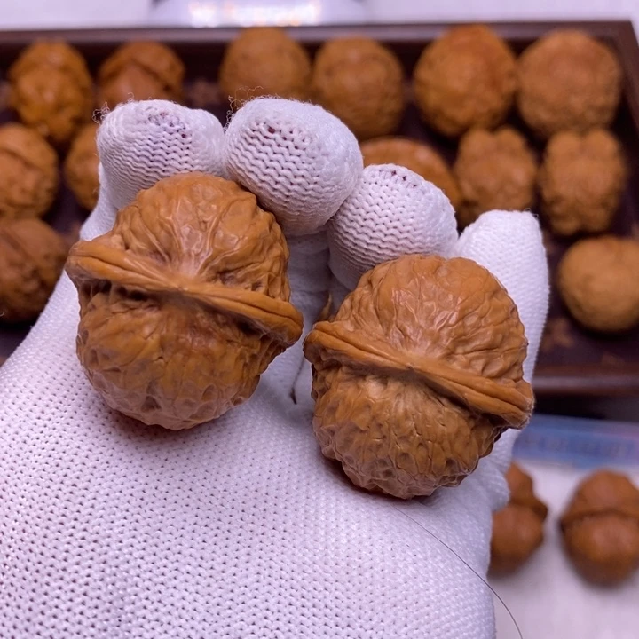 文玩核桃把件铁磨元宝34尺