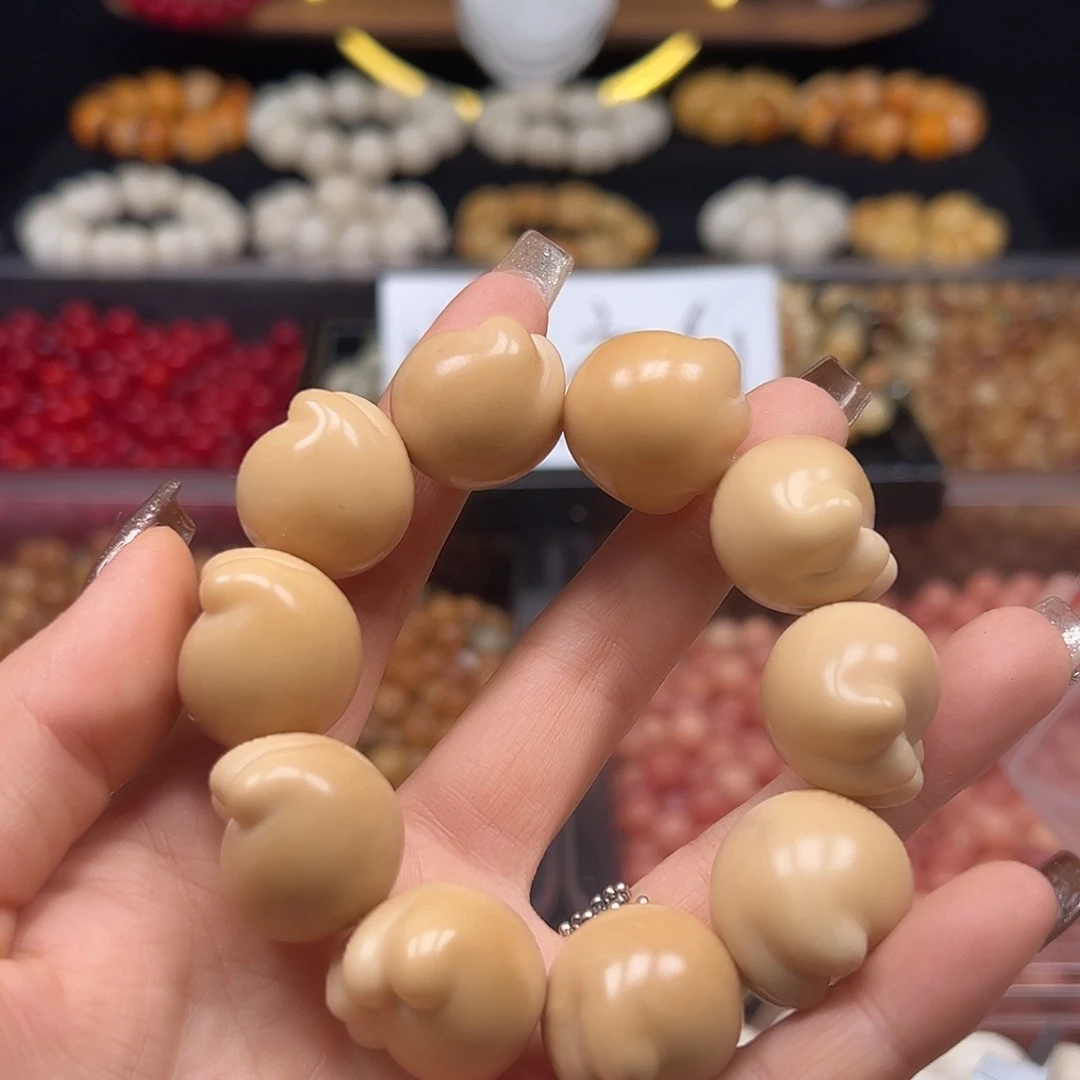 手串菩提根/象牙果瑕疵茶色猫爪1条有裂