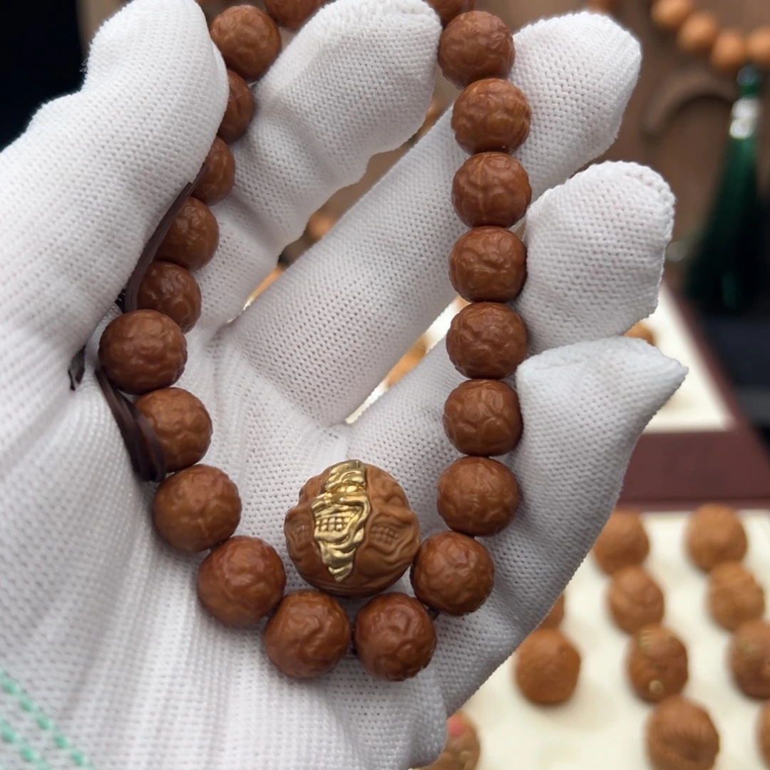 猴头核桃手串微瑕舍利。铜撕裂